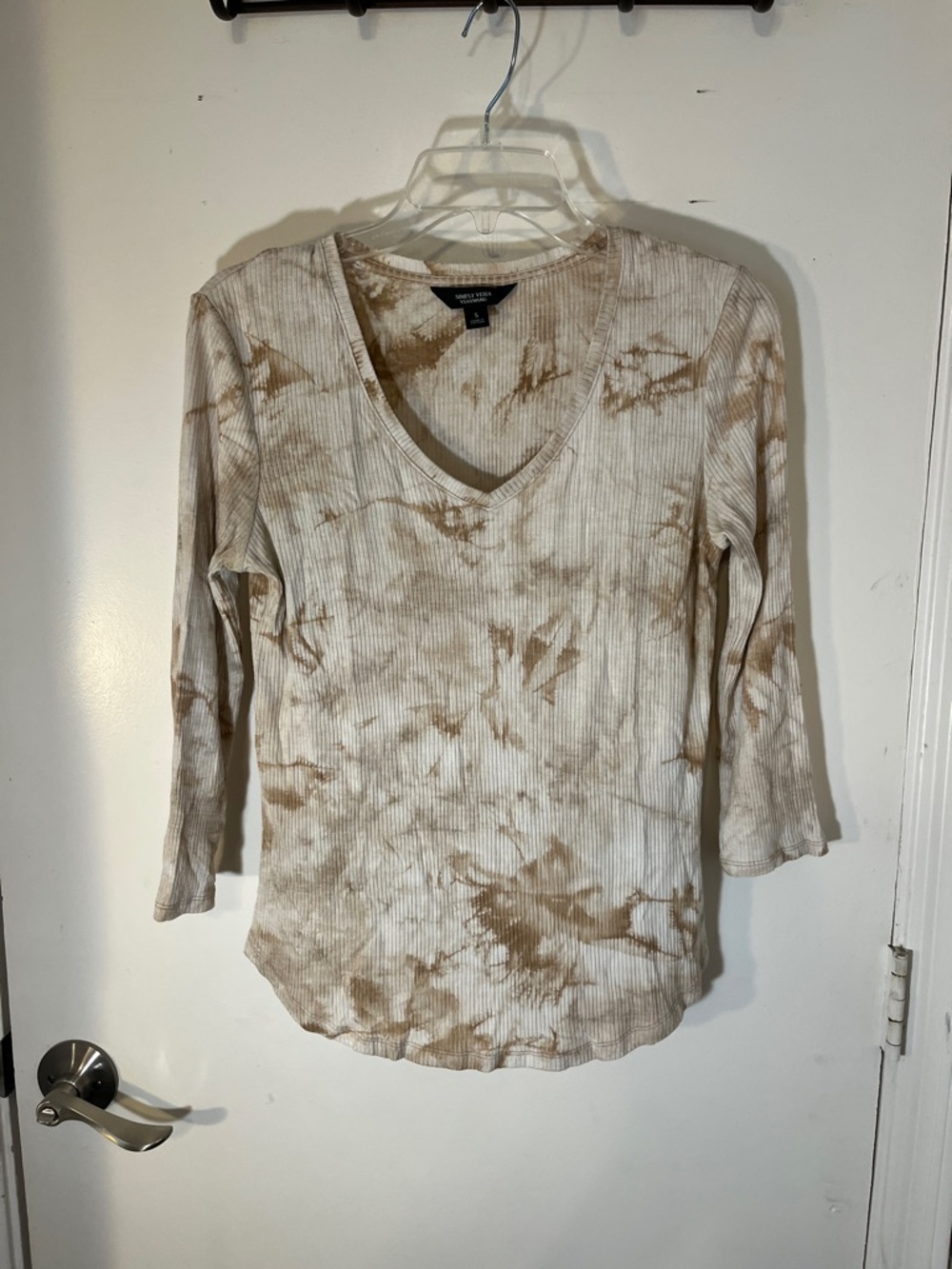 Simply, Vera Wang knit shirt size small 95% Rayon three-quarter length sleeve.